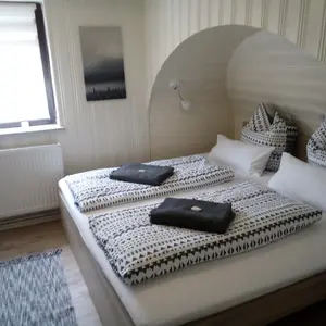 Gästehaus Isabelle Schlafzimmer mit Doppelbett 